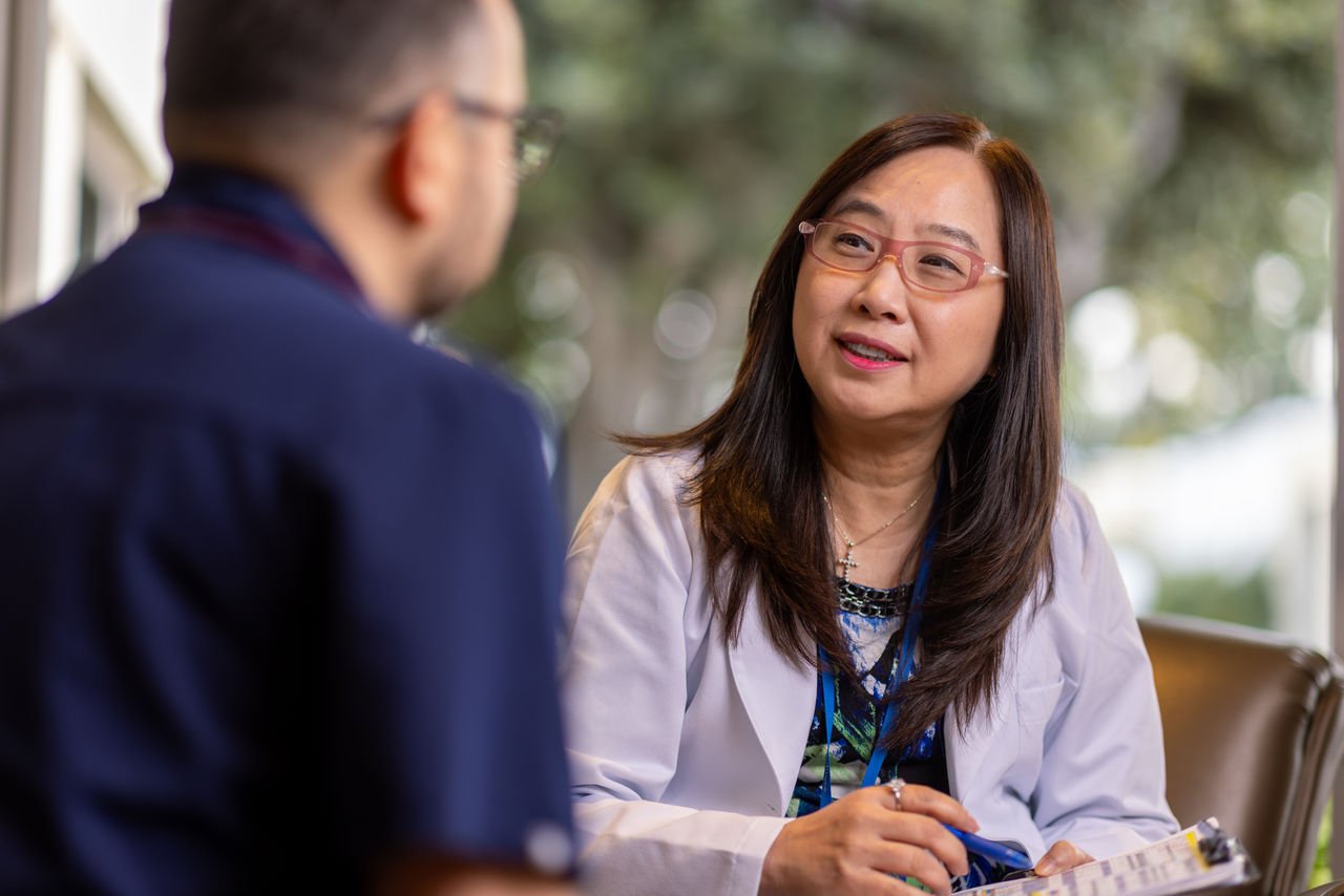 Clinician and patient talking