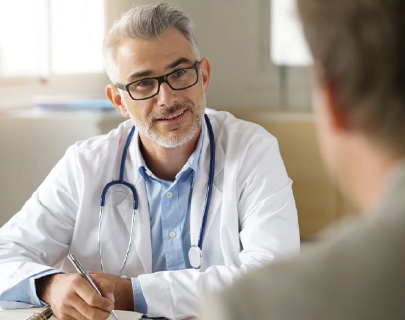 Doctor smiling at patient